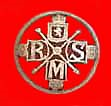 Florin carved into a brooch with initials R M S