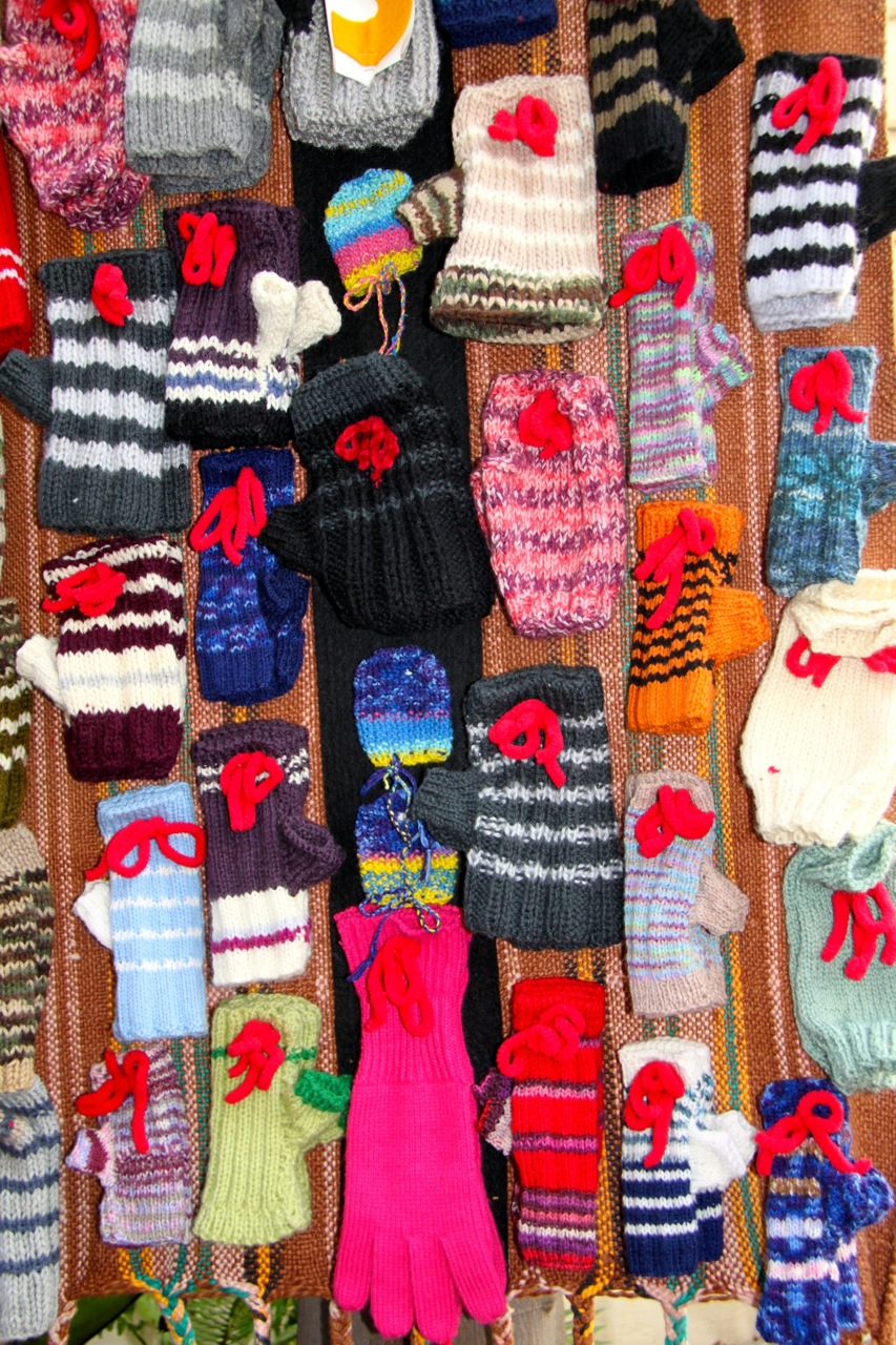100 pairs of hand-knitted fingerless mittens